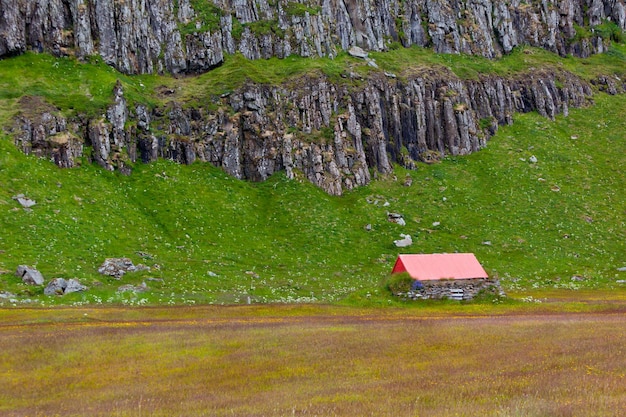 Icelandic Nature Landscape with Mountains and Dwelling