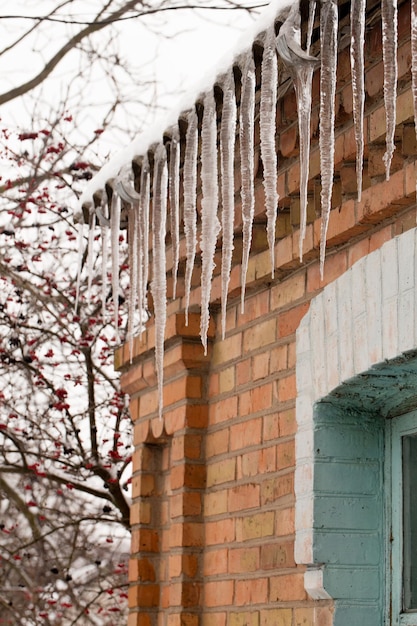 Icicles hanging from house