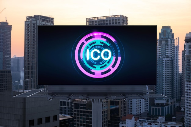 ICO hologram icon on billboard over panorama city view of Bangkok at sunset The hub of blockchain projects in Southeast Asia The concept of initial coin offering decentralized finance