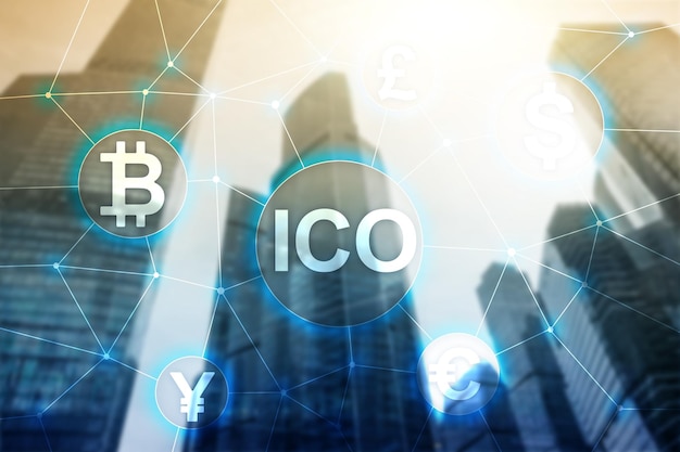 ICO Initial coin offering Blockchain and cryptocurrency concept on blurred business building background