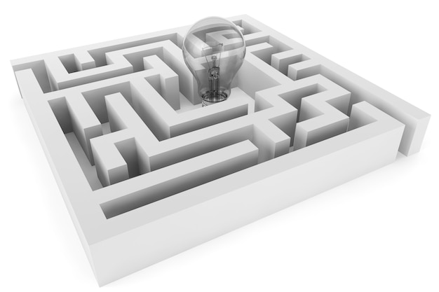 Idea Concept. Closeup Light Bulb in labyrinth on a white background