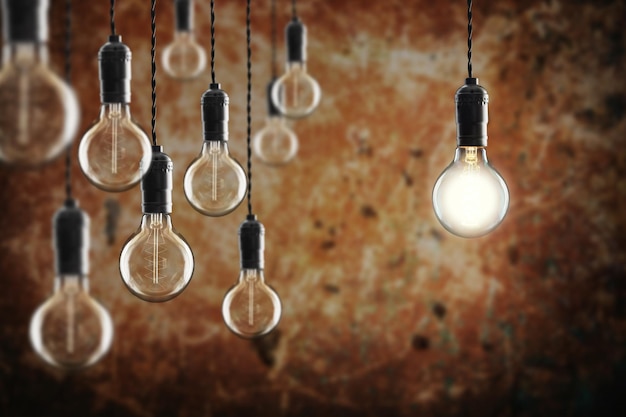 Idea and leadership concept bulbs on the grunge background