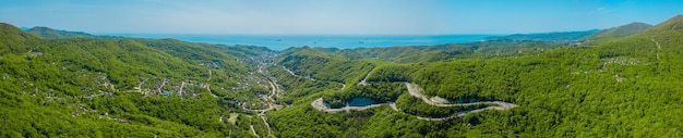 Idyllic panoramic landscape nature view of caucasus mountains and black sea