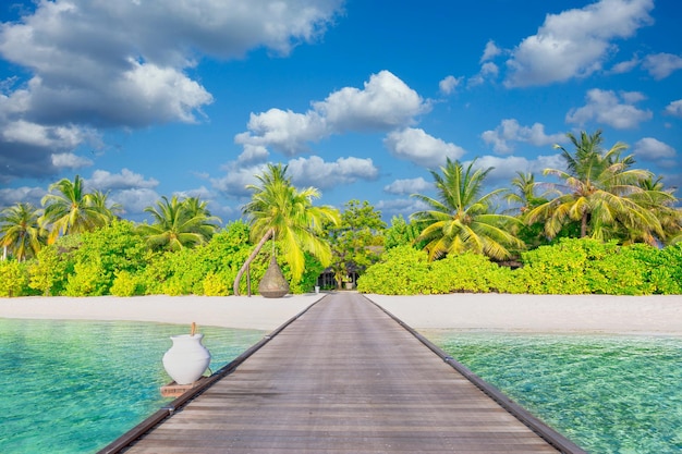 Photo idyllic tropical beach landscape in maldives wooden pier into paradise island amazing vacation