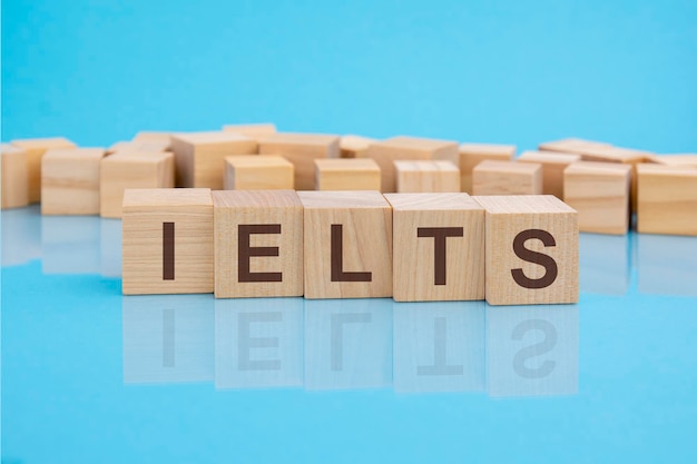 IELTS text of on wooden cubes reflected from the bright blue surface