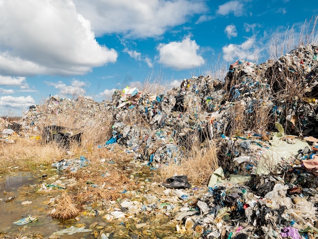 Photo illegal plastic dump. the toxic plastic exported from germany is collected in empty quarries of poland and is not recycled.