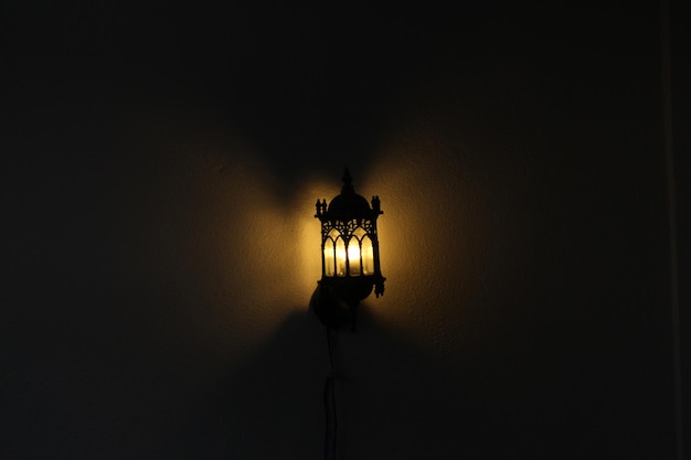 Photo illuminated electric lamp at night