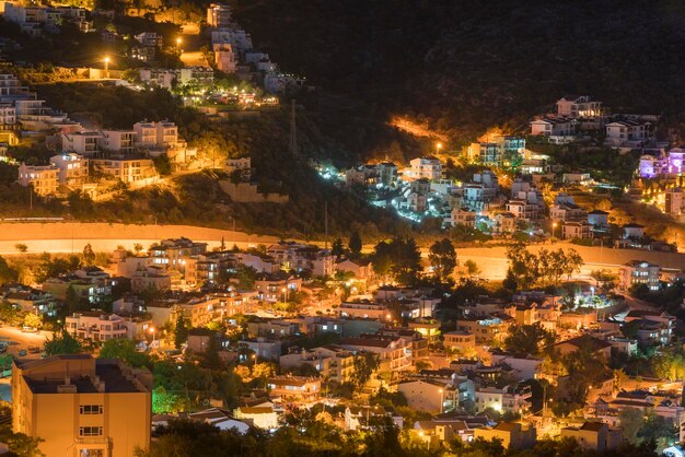 Illuminated resort city at night top view