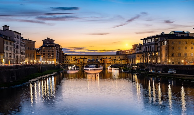 Illumination on Ponte Vecchio at early sunrise in Florence