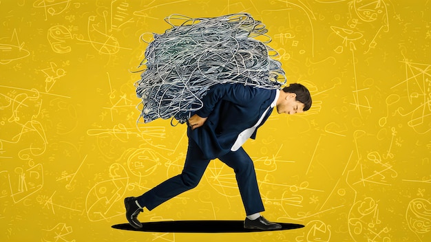 illustration office man with a large bundle of string stress pressure work load concept