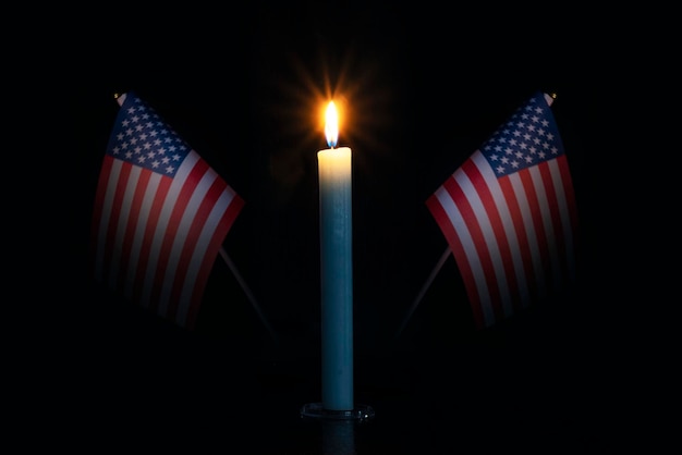 Illustrative Tragedy USA war Candles flag background USA Pray for America