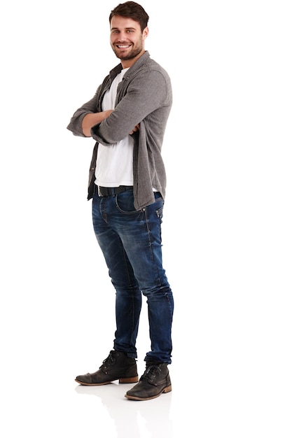 Im satisfied with my progress Portrait of a young man standing with his arms crossed isolated on white