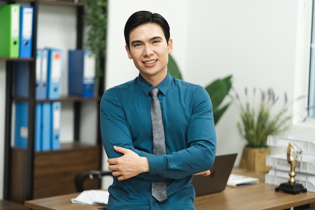 Image of Asian male businessman working in the office