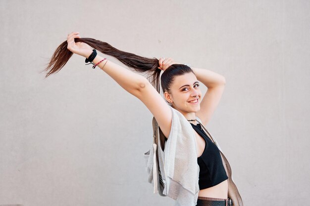 Image of attractive woman showing her long hair