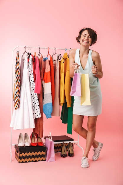 Image of a beautiful woman stylist posing isolated 