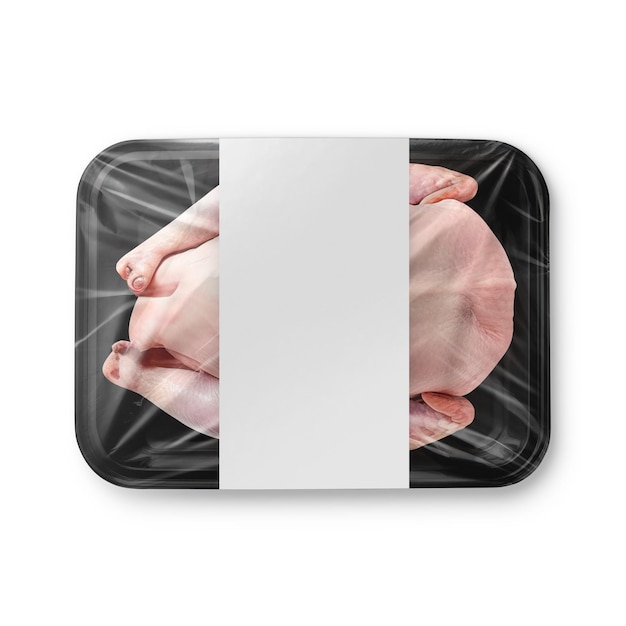 Photo a image of a black plastic tray of chicken with label isolated on a white background