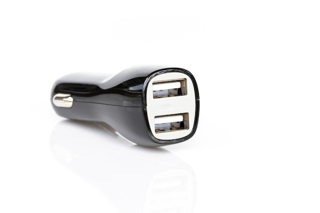 Image of black USB car charger isolated on white 