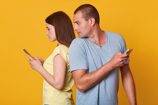 Image of concentrated woman typing messages