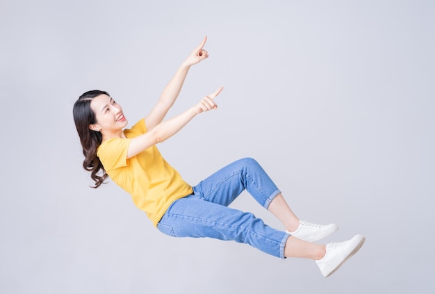 Image of falling Asian woman