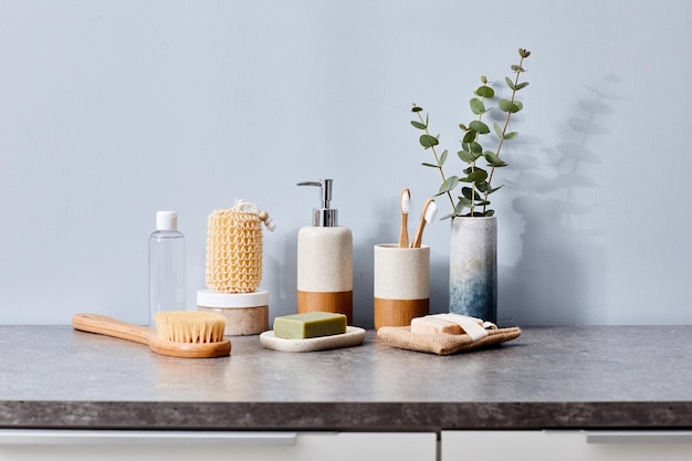 Image of female toilet table with brush for massage and other hygiene products in bathroom