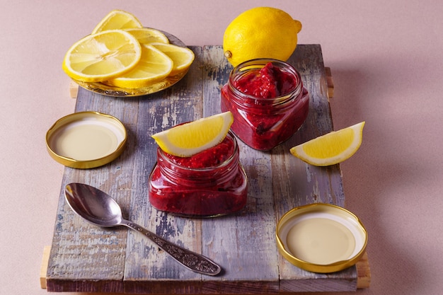 An image of  fresh red berry smoothie on a board.  