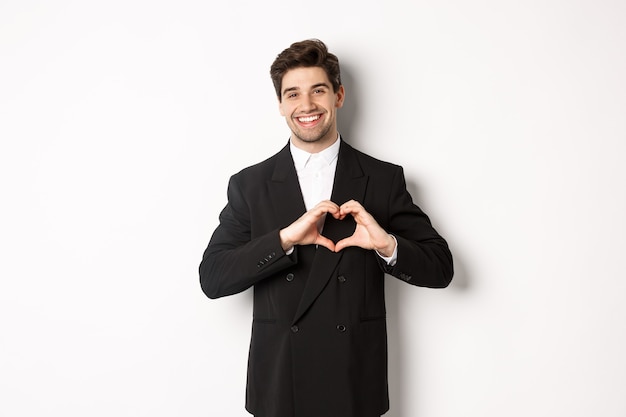 Image of handsome groom in black suit