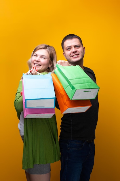 Image of man and woman with shopping bags