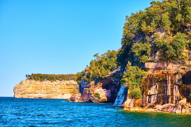 Image of Pictured Rocks coastal shot of distant face rock