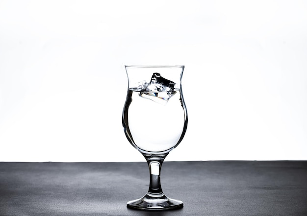 The image of pouring drinking water into a glass