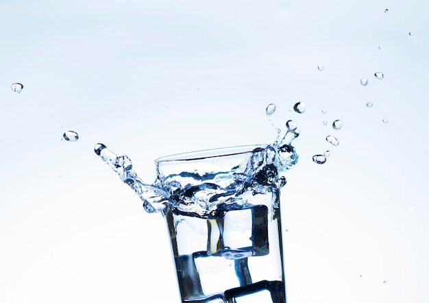 The image of pouring drinking water into a glass