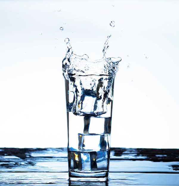 The image of pouring drinking water into a glass