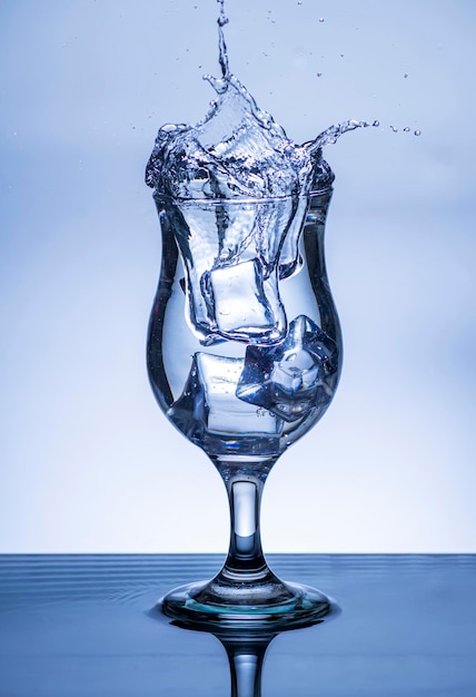 The image of pouring drinking water into a glass