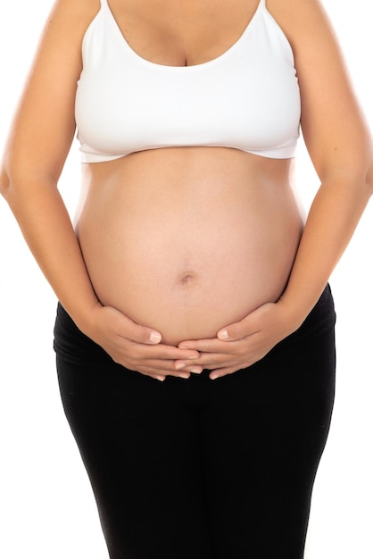 Image of pregnant woman touching her belly with hands