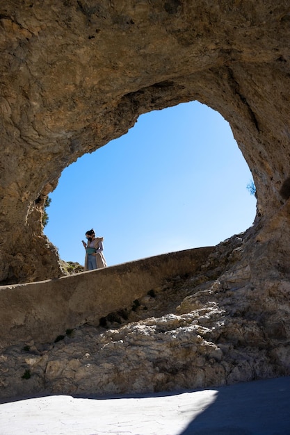 Image of the silhouette of a person in the window of the devil Cuenca Spain