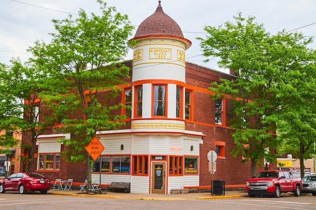 Image of Small town architecture of orange and brick building