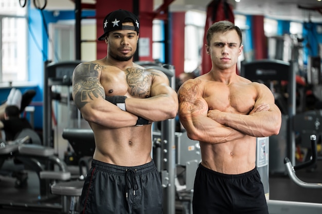 An image of two men at the gym