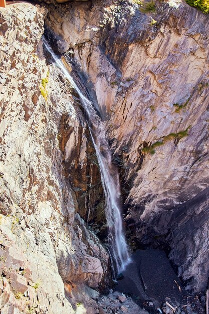 Image of Vertical of waterfall cutting through gorge