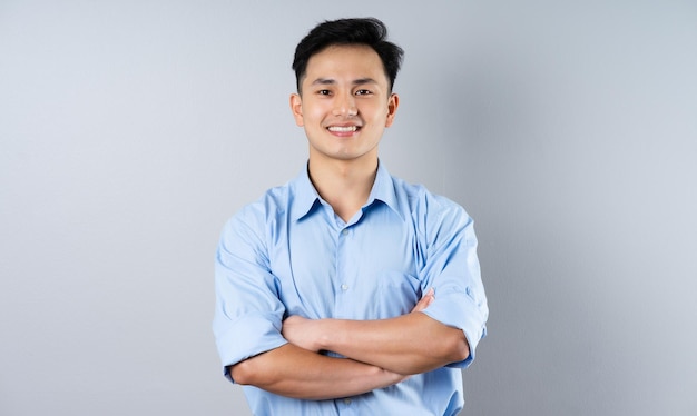 Image of young businessman male on gray background