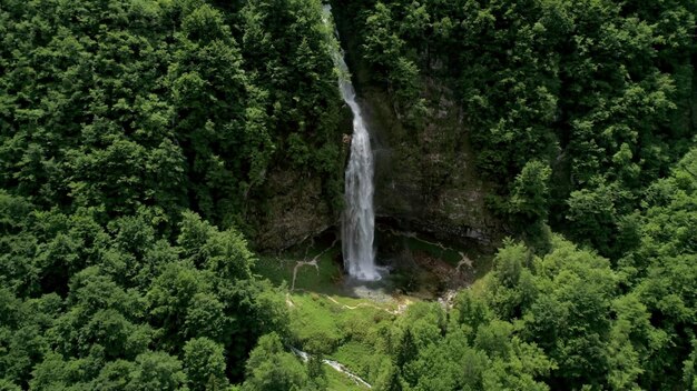 Immerse yourself in the breathtaking beauty of this stunning waterfall nature photo