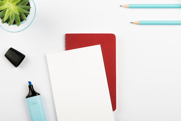 Important Announcements On Piece Of Paper Over Notepad On Desk With Flower And Marker Crutial Informations On Note Over Notebook On Table With Pencils