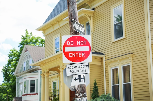 An imposing red 'Do Not Enter' sign stands tall conveying a powerful message of restriction danger