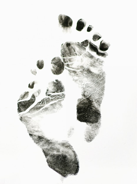 Photo imprint of  feet on white background