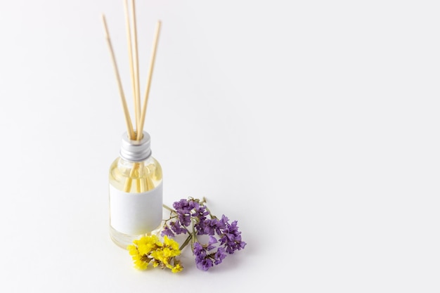 Incense sticks for home with floral scent Flowers and dried flowers with aroma diffuser Ecofriendly home fragrance concept