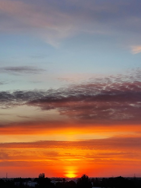 Incredible blue and golden sunset landscape heavy clouds