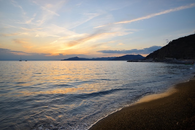 incredible colors and lights for a romantic sunset over the sea in Liguria