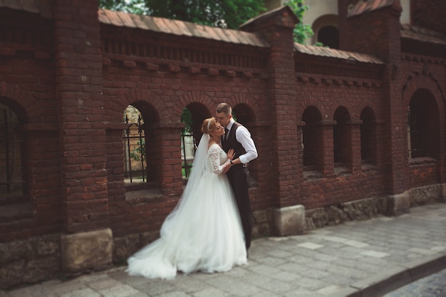 Incredible young wedding couple of the morning city.Walk in the wedding day