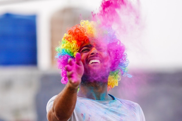 A indian Boy playing holi with gulala image HD