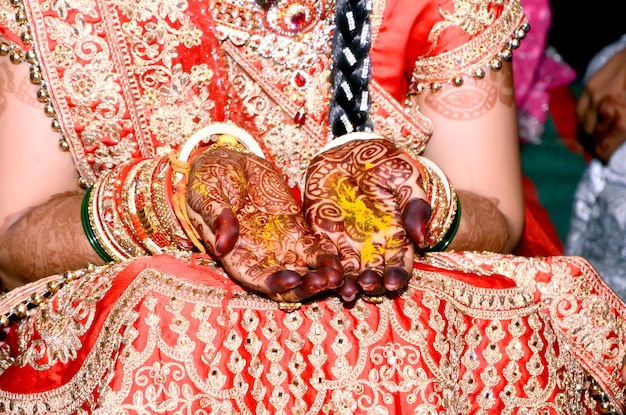 Indian bride showing mehndi tattoos design