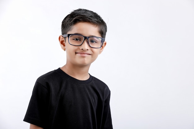 Indian child wearing spectacles isolated