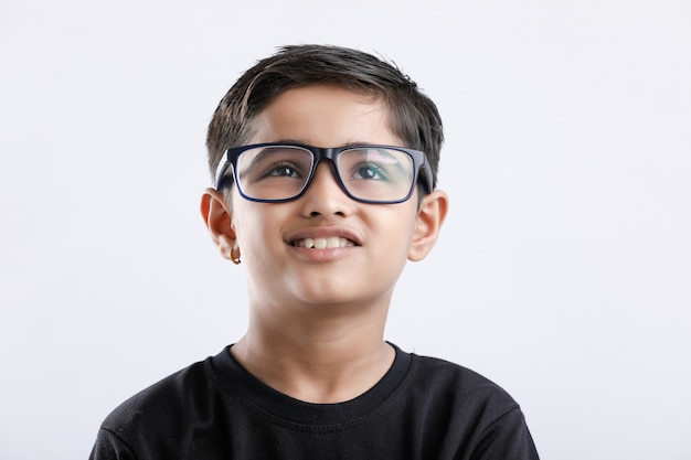 Indian child wearing spectacles and looking seriously